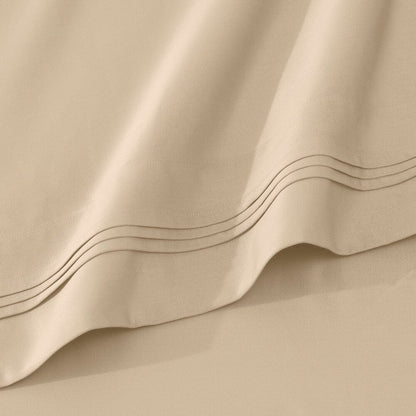 Jeu de draps uni en coton égyptien supérieur, 1000 fils, avec poche profonde.