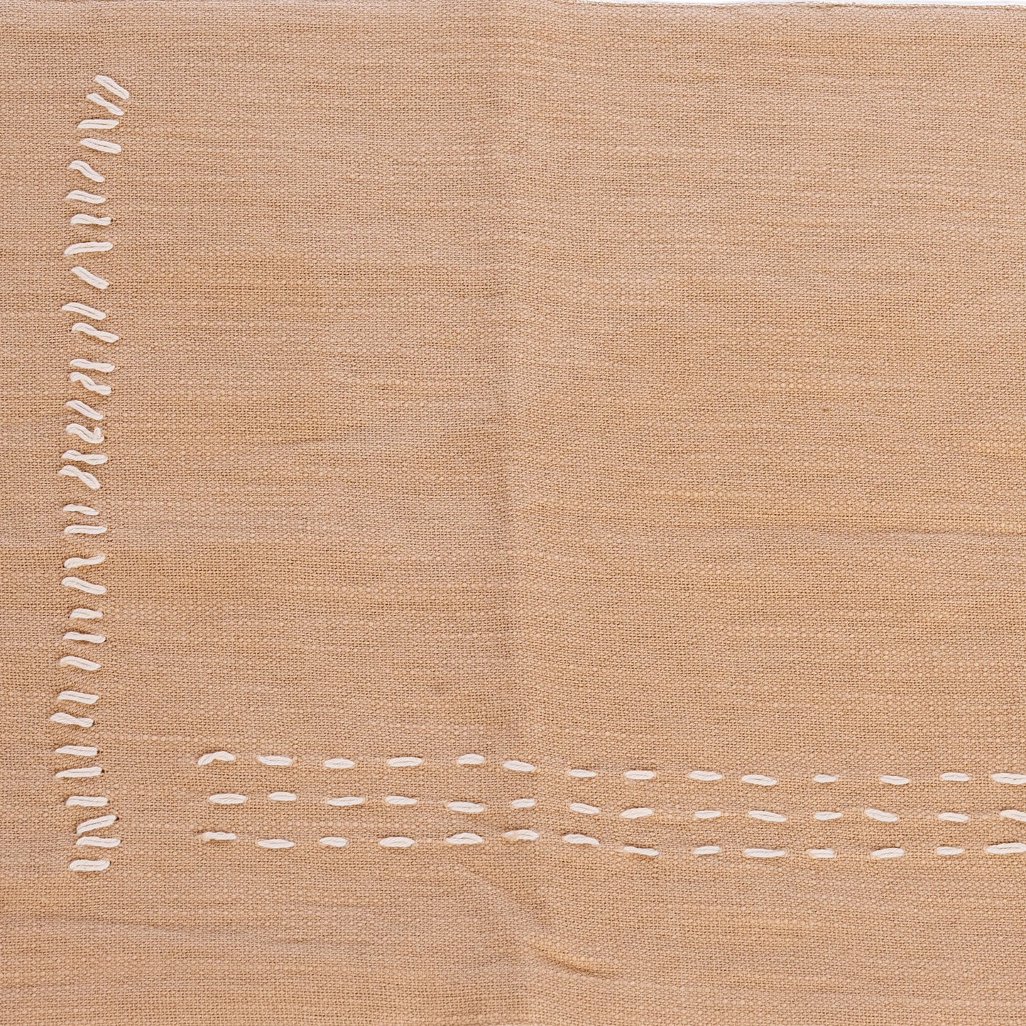 Tire-bouchon en coton slub beige brodé à la main