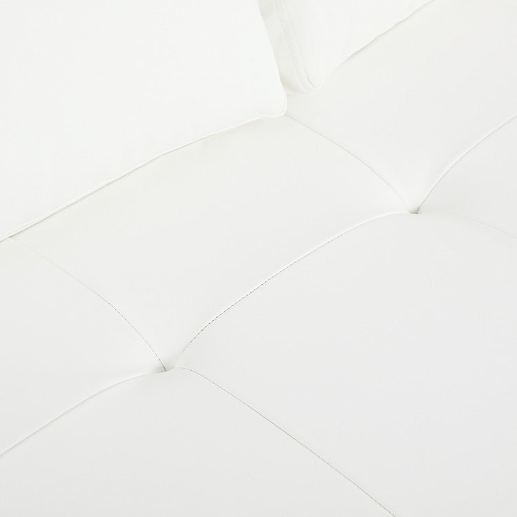 Canapé moderne en cuir véritable avec pieds en bois et coussin supplémentaire.