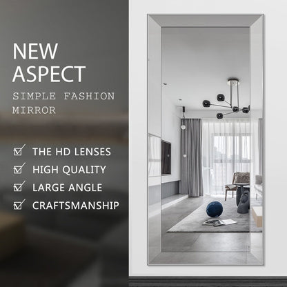 Miroir mural argenté à longueur corporelle, biseauté, réfléchissant et au design métallique élégant.