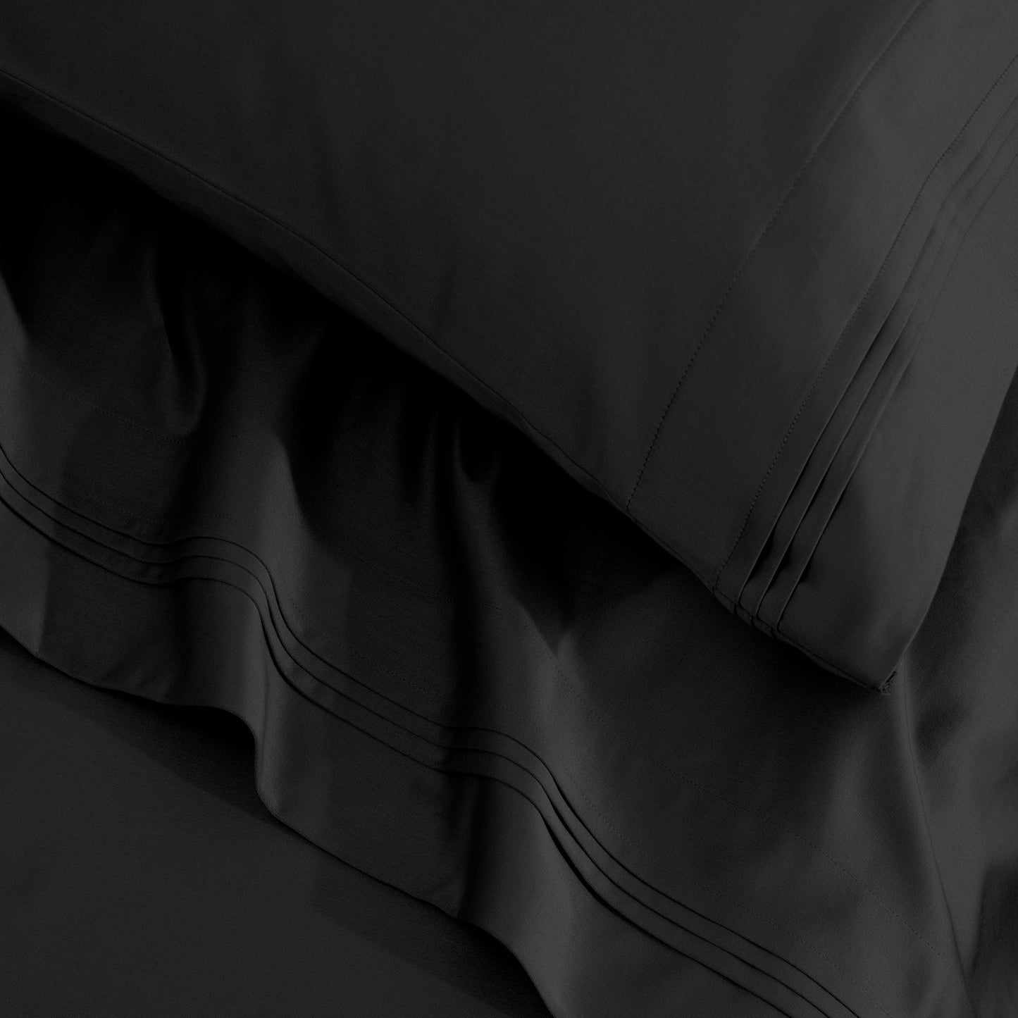 Jeu de draps uni en coton égyptien supérieur, 1500 fils au pouce, avec poche profonde.